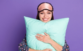 woman holding a pillow sleep